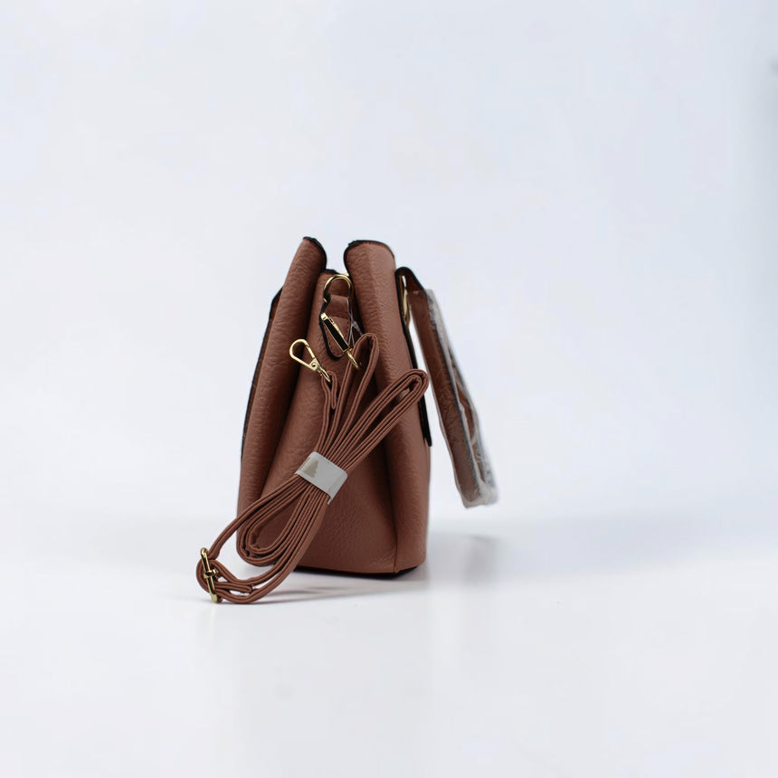 Vegan Leather Satchel & Wallet Set, side view with the folded crossbody strap clipped on