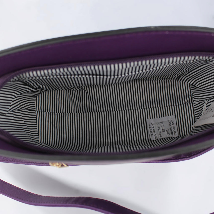 Saffiano Vegan Leather Crossbody, interior view showing zebra stripe lining