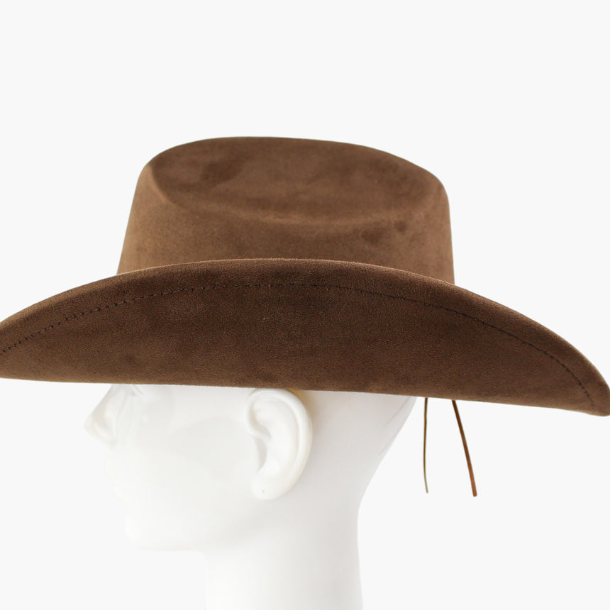 Brown Faux-Suede Western hat, in profile showing the adjuster cord emerging from under the brim beside the ear