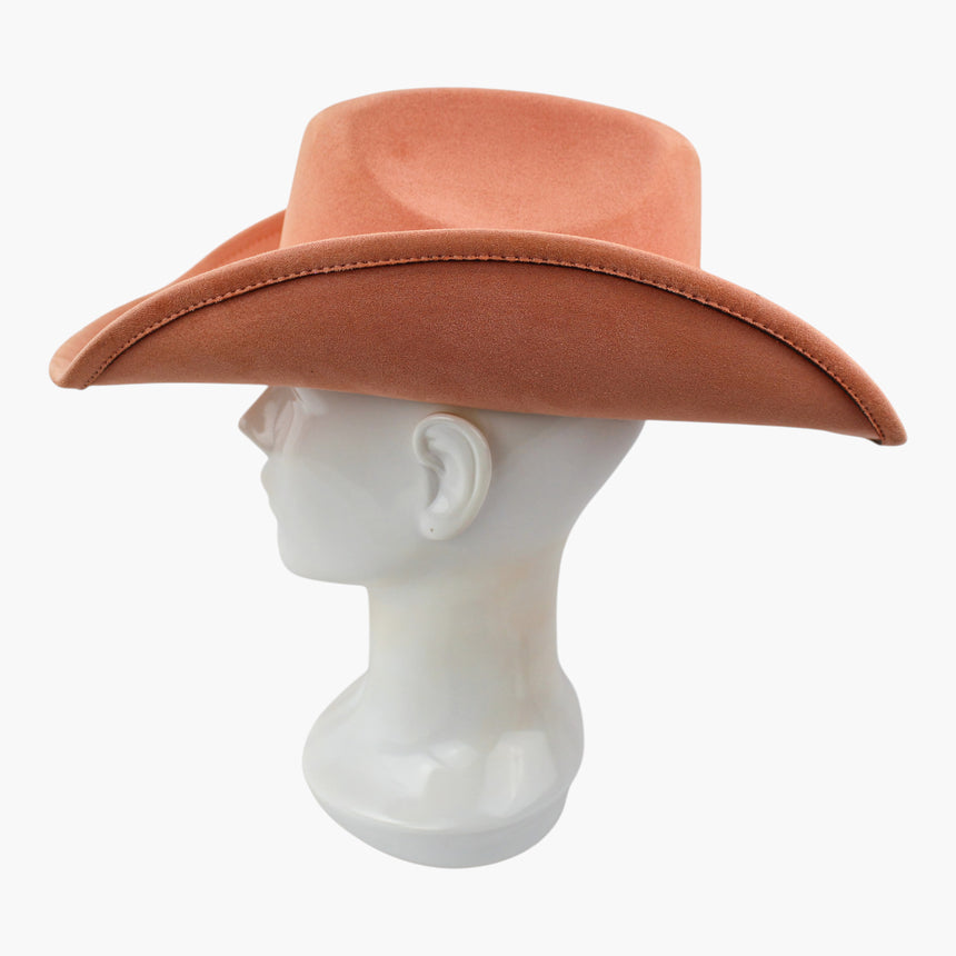 Peach-Jacquard Faux-Suede Western hat, in profile showing the deep curl of the brim in silhouette