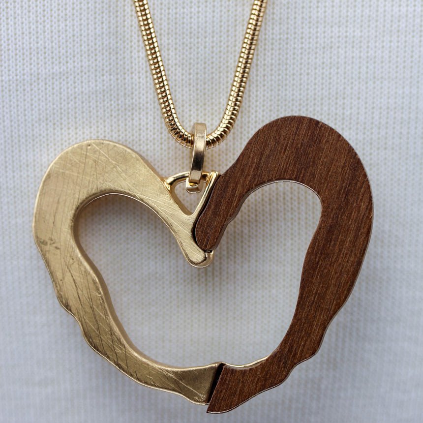 Two-Tone Open Heart Necklace — Wood & Alloy, 2 Colors, close-up of the gold and wood heart pendant on snake chain