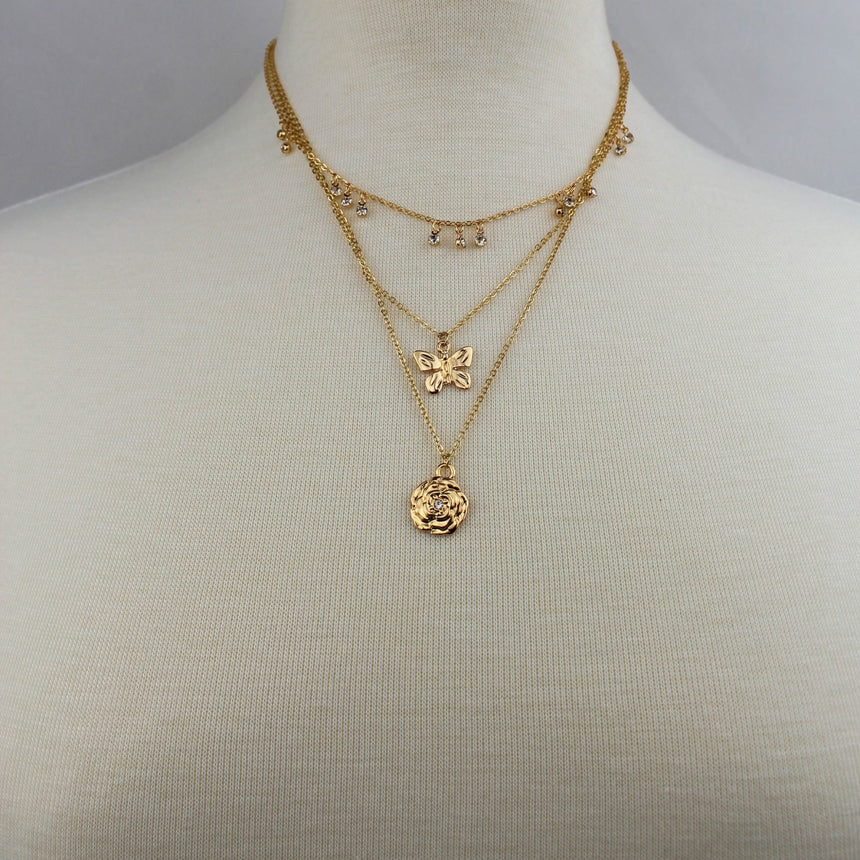 Triple Layer Butterfly Necklace — Gold-Tone or Silver-Tone Alloy, gold finish worn on a mannequin, all three layers