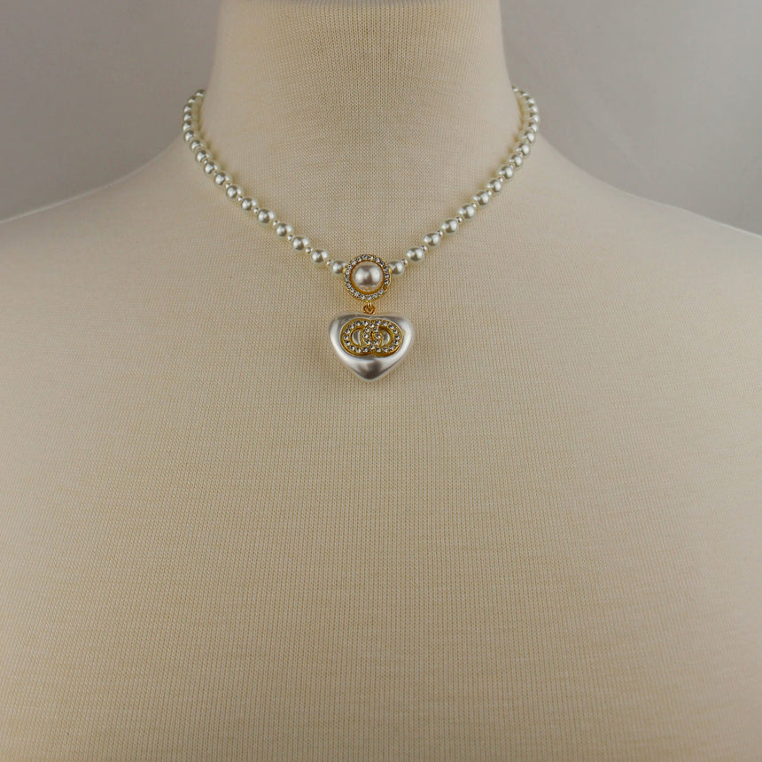 Pearl Strand Heart Necklace — Faux Pearls, Crystal Ring Emblem, full strand worn on a mannequin