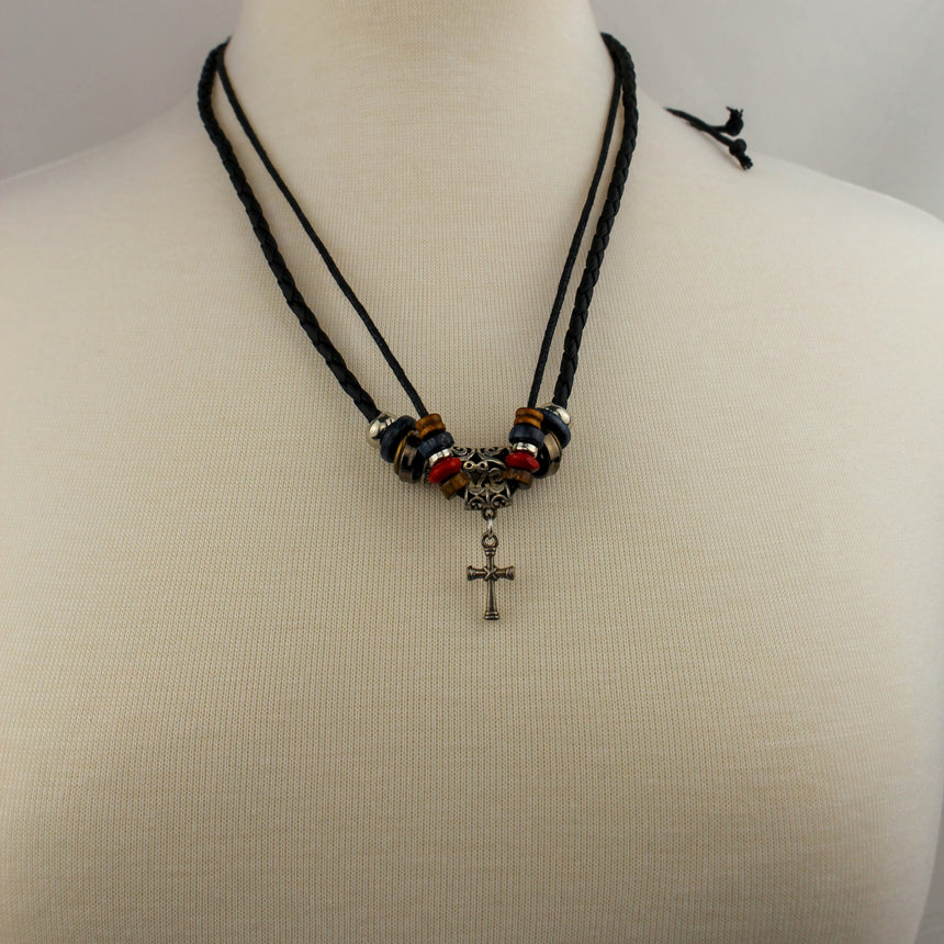 Braided Black Cord Choker — Disc Beads, Cross Dangle, full view showing the adjustable slide knots
