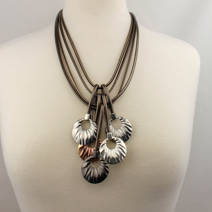Multi-Cord Statement Necklace — Textured Discs, Mixed Tones, full necklace on mannequin