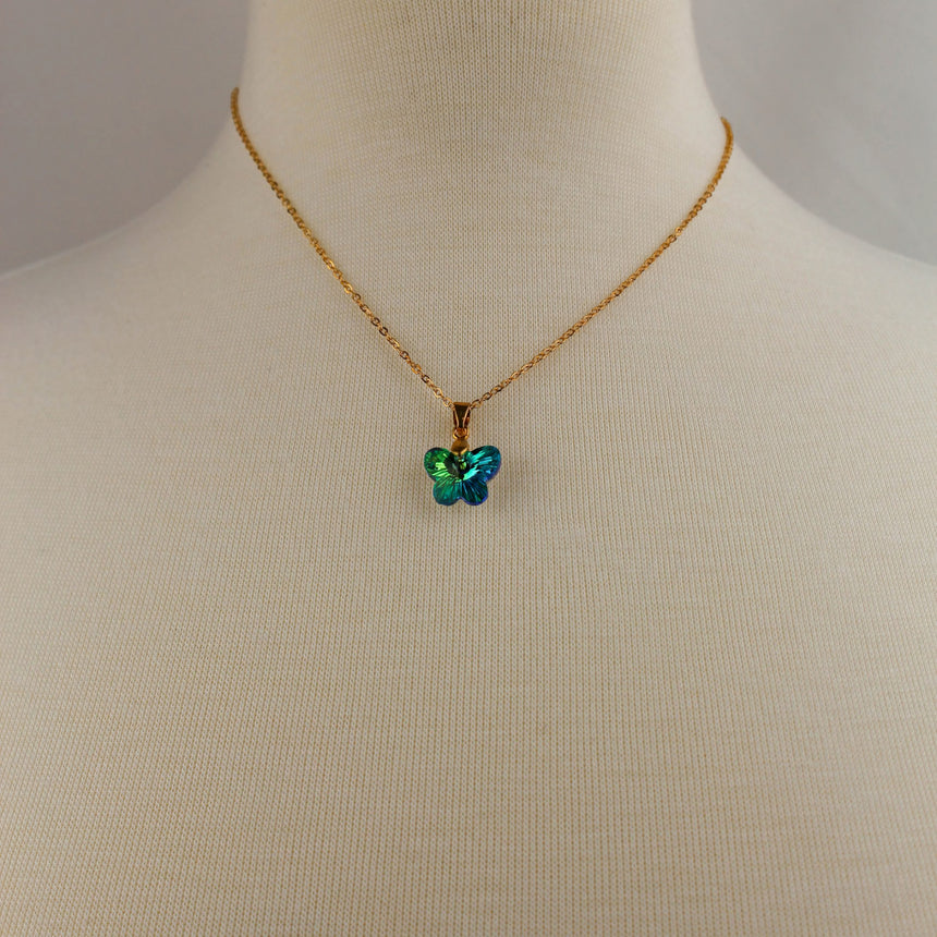 Crystal Butterfly Pendant Necklace — Glass, Four Colorways, Emerald colorway, necklace on mannequin