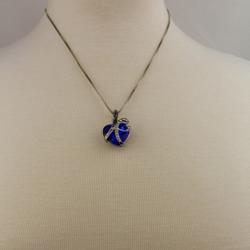 Blue Crystal Heart Necklace — I Love You Ribbon, Silver-Tone, pendant worn on a mannequin