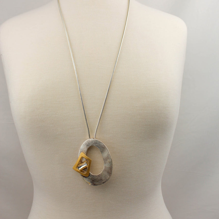 Organic Oval Pendant Necklace — Silver-Tone Chain, Crystal, full-length view on a mannequin