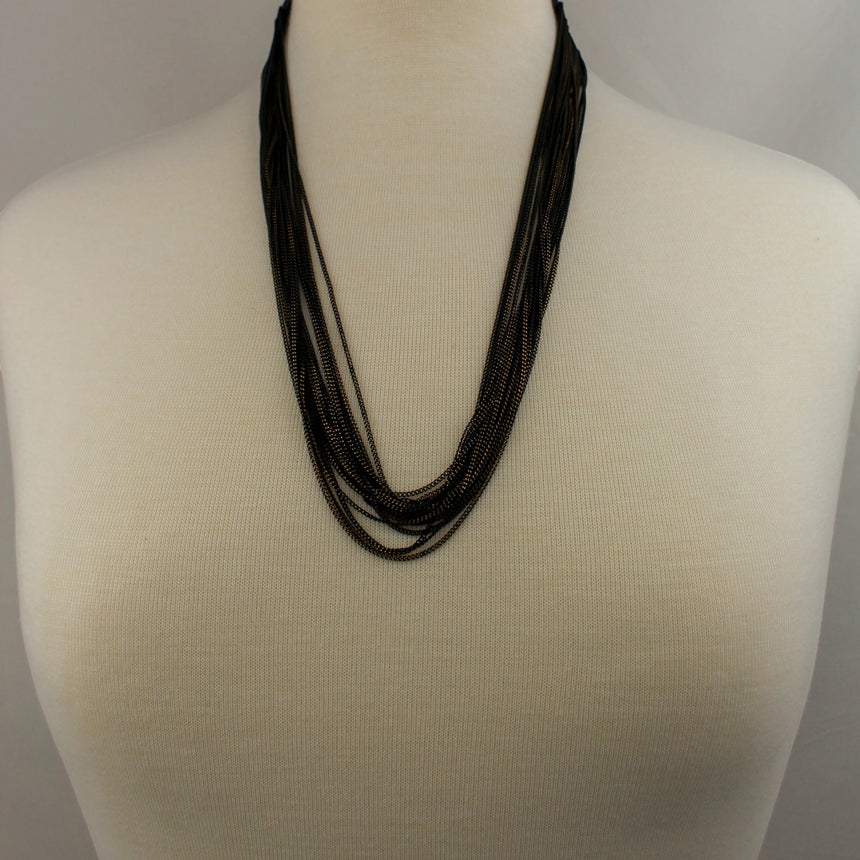 Multi-Strand Chain Necklace — Two-Tone Alloy, Draped Layers, full draped strands on mannequin