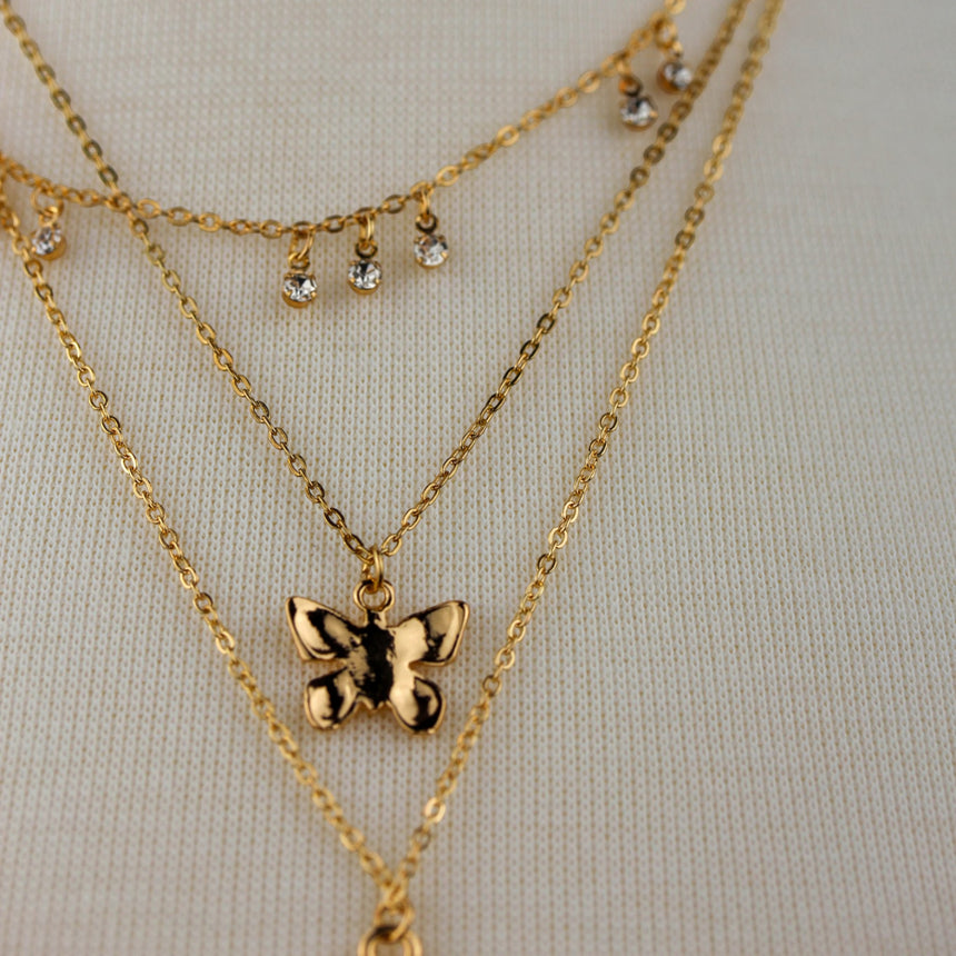 Triple Layer Butterfly Necklace — Gold-Tone or Silver-Tone Alloy, gold finish close-up of crystal drops and butterfly