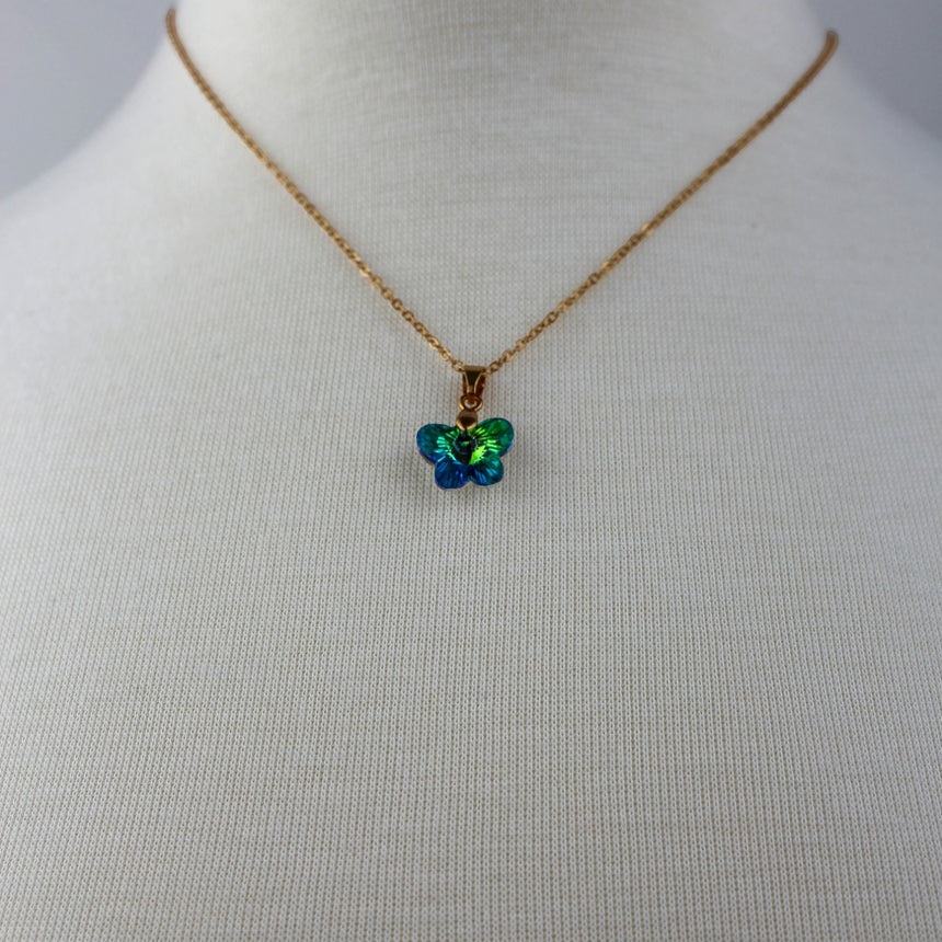 Crystal Butterfly Pendant Necklace — Glass, Four Colorways, Emerald colorway, close-up of the green crystal butterfly