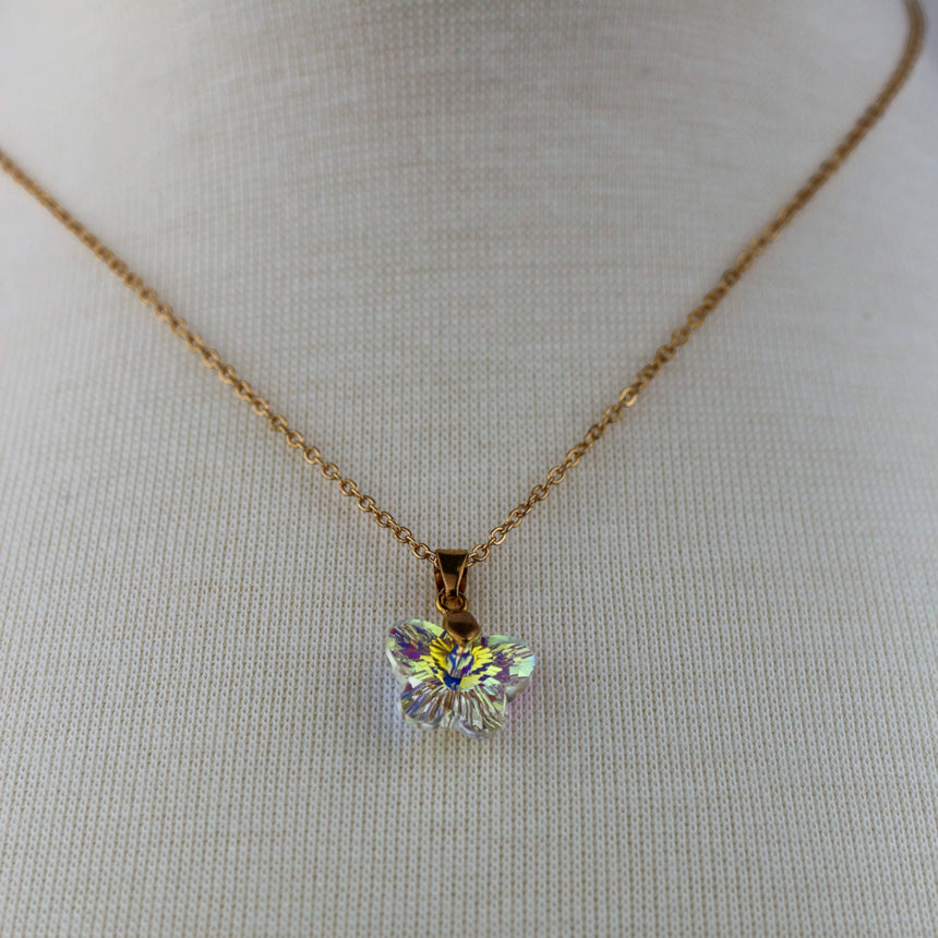 Crystal Butterfly Pendant Necklace — Glass, Four Colorways, Clear colorway, close-up of the iridescent butterfly