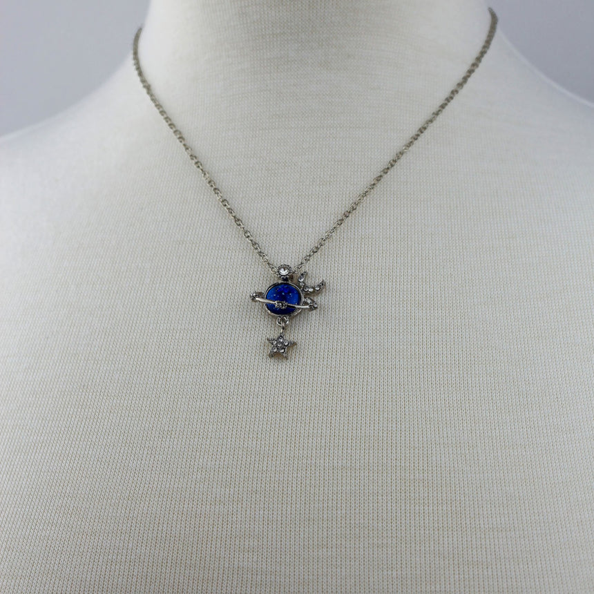 Saturn Pendant Necklace — Silver-Tone Alloy, Star Dangle, mid view showing pendant and cable chain
