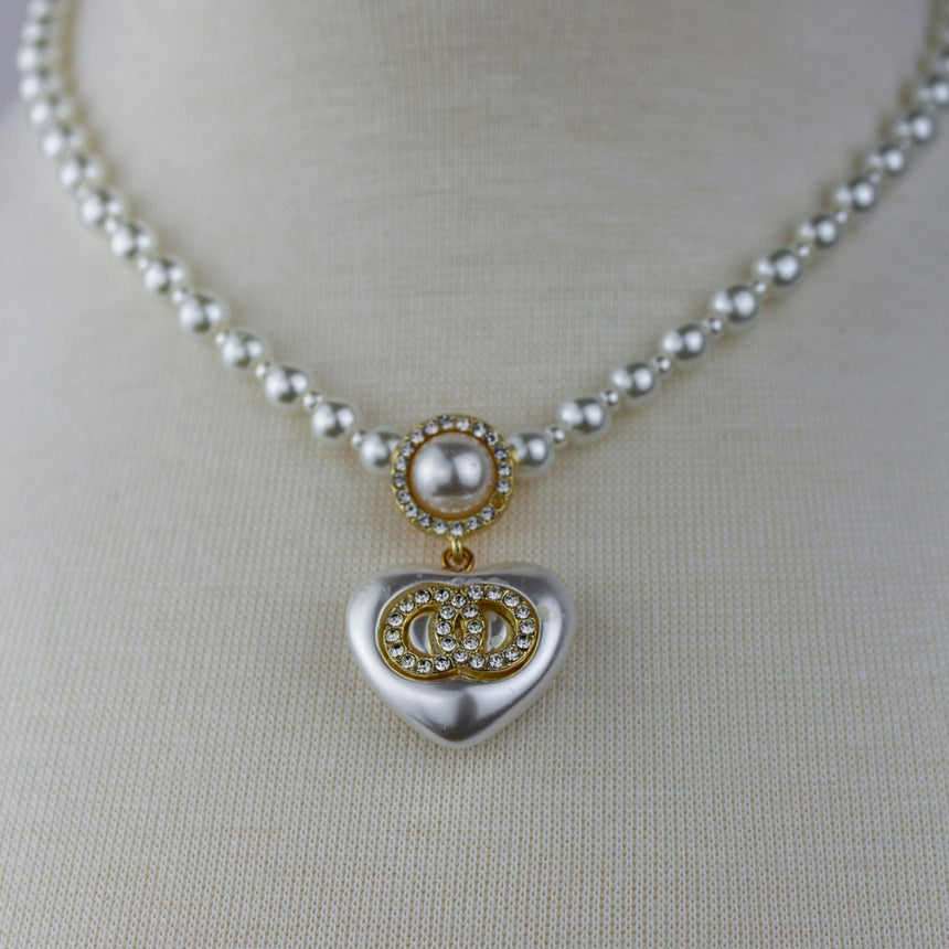 Pearl Strand Heart Necklace — Faux Pearls, Crystal Ring Emblem, close-up of the puffed heart and pearl halo