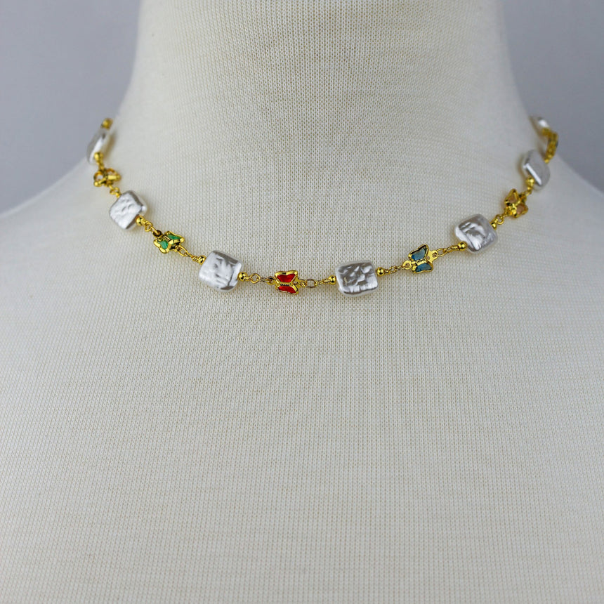 Pearl-Tile Butterfly Choker — Gold-Tone Alloy, Stations, front view of the choker on a mannequin