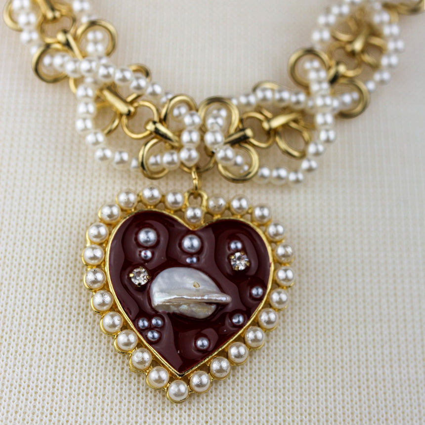 Pearl-Woven Collar Necklace — Gold-Tone Alloy, Heart Drop, close-up of the burgundy heart pendant