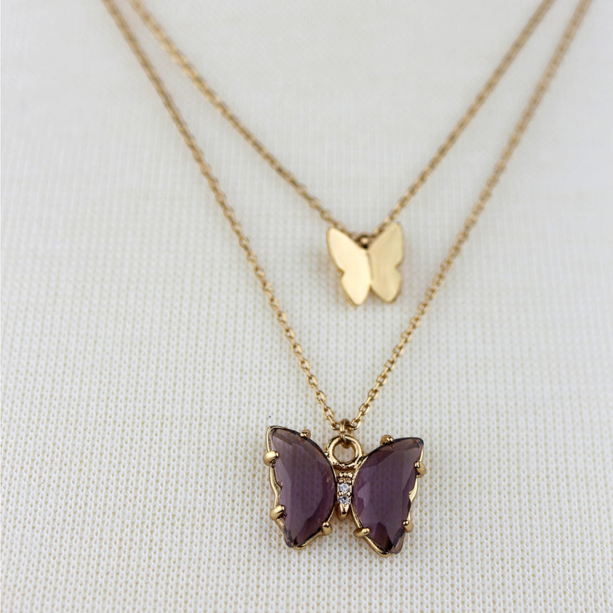 Layered Butterfly Necklace — Gold-Tone Alloy, Two Colorways, Purple colorway, close-up of the plum crystal butterfly