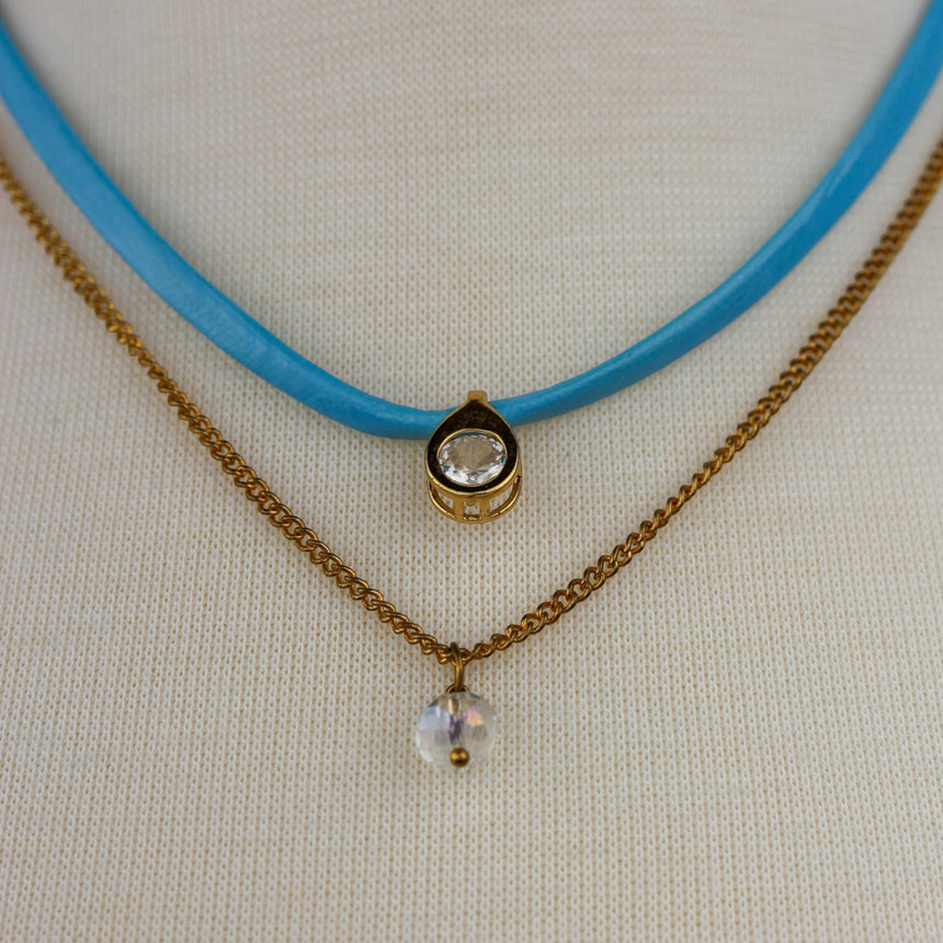 Blue Suede Choker Set — Gold-Tone Chain, Matching Stud Earrings, close-up of the teardrop charm and chain layer