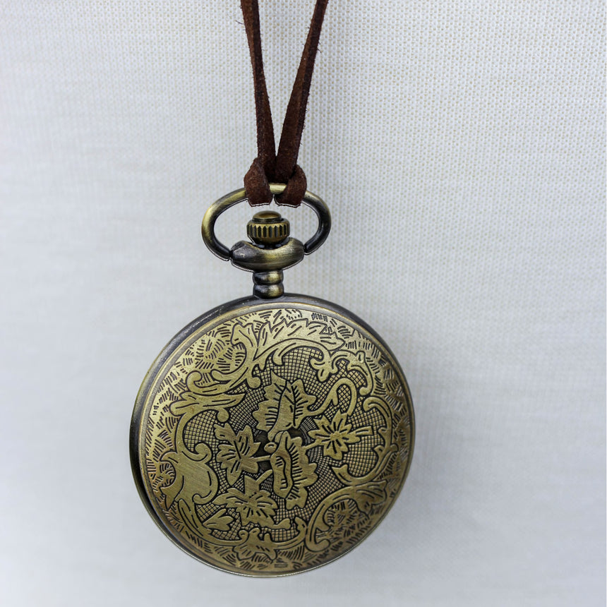 Pocket Watch Necklace — Bronze-Tone Alloy, Faux-Suede Cord, angled view of the filigree case back