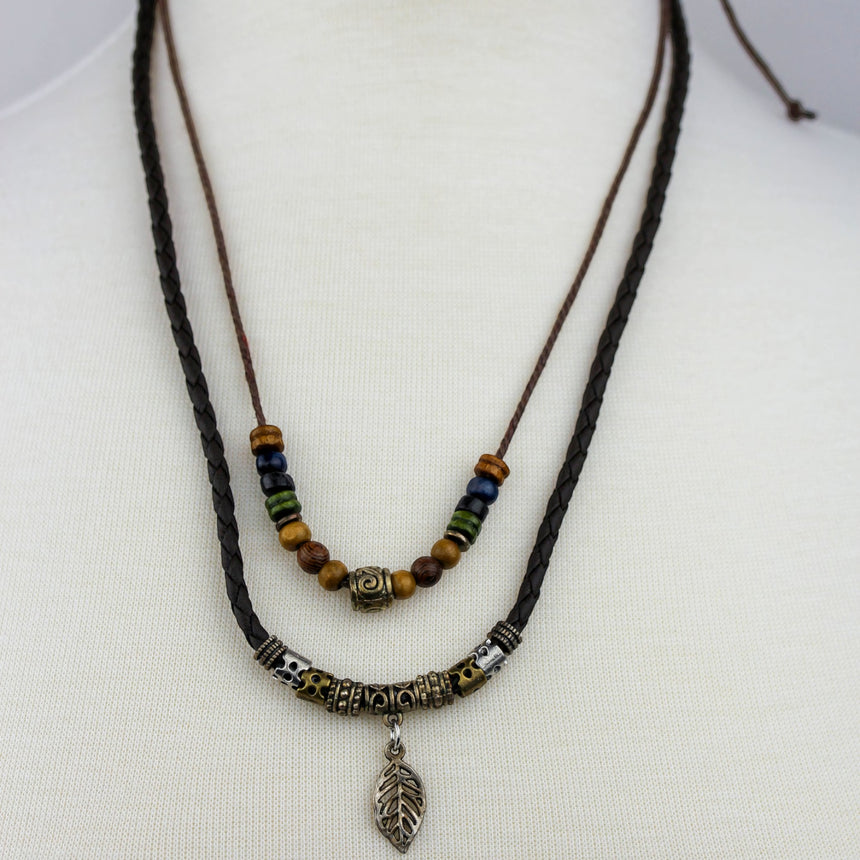 Double-Strand Cord Necklace — Beaded, Silver-Tone Leaf Charm, both strands with leaf charm on mannequin