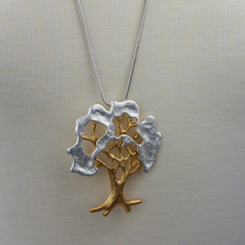 Two-Tone Tree Pendant — Matte Gold and Silver-Tone Alloy, front view of the pendant on the snake chain