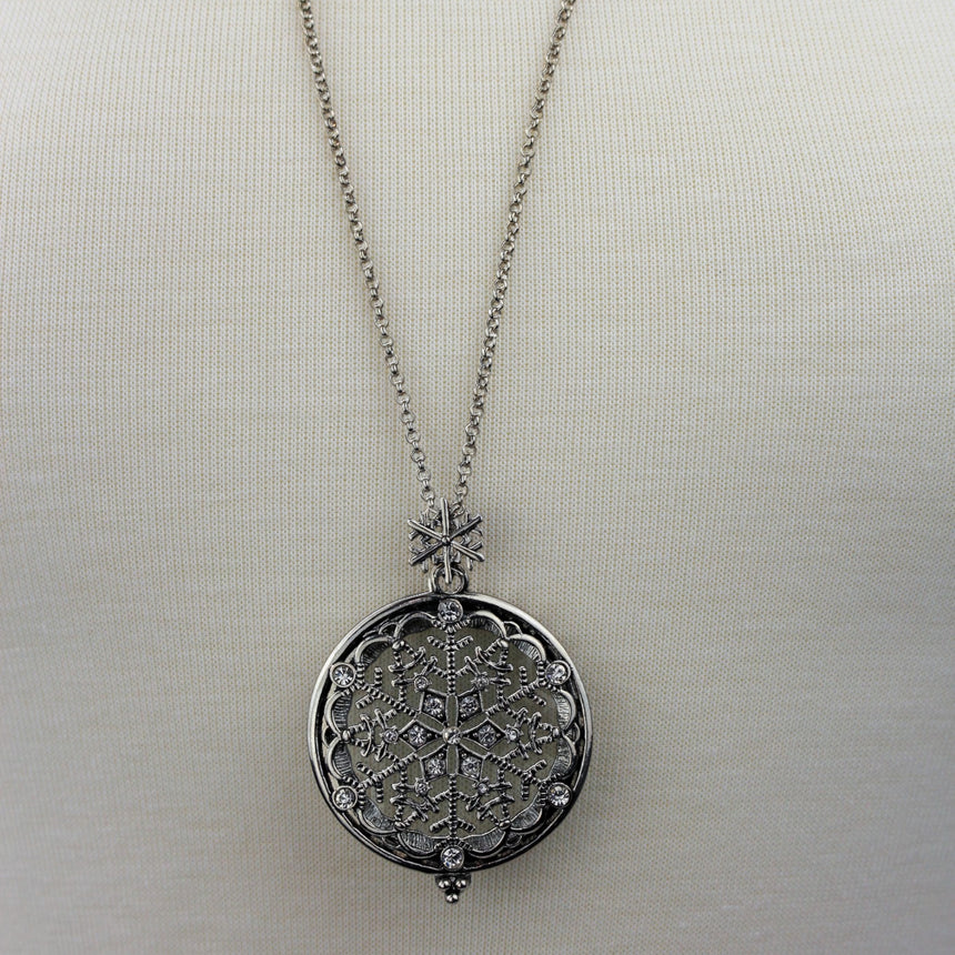 Snowflake Filigree Locket — Gunmetal-Tone Alloy, Magnifier, pendant and snowflake bail at chest height