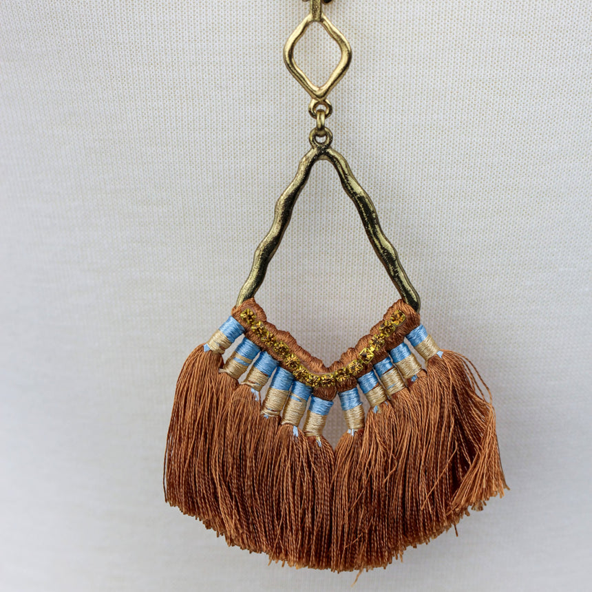 Boho Seed Bead Necklace — Rust Tassel Fringe, Antiqued Alloy, close-up of the tassel fringe pendant
