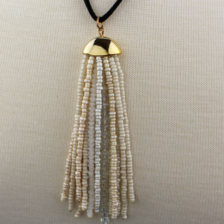 Cream Seed-Bead Tassel Necklace — Glass Beads, Faux Suede, close-up of the cream seed-bead tassel and gold-tone cap