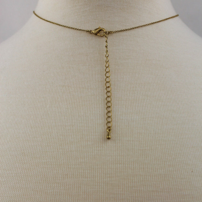 Marble Look Disc Pendant — Printed Cross Reverse, Gold-Tone Chain, lobster clasp and extender chain at the back