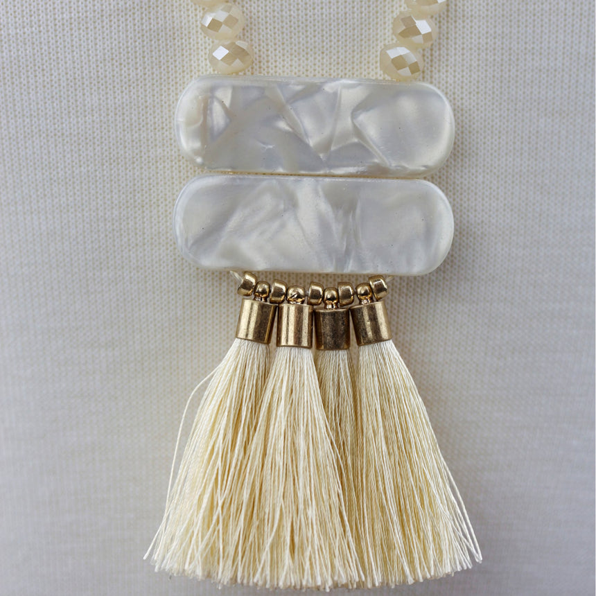 Champagne Tassel Fan Necklace — Glass Crystal Beads, Silk Tassels, close-up of the pearlescent bars and tassel fan