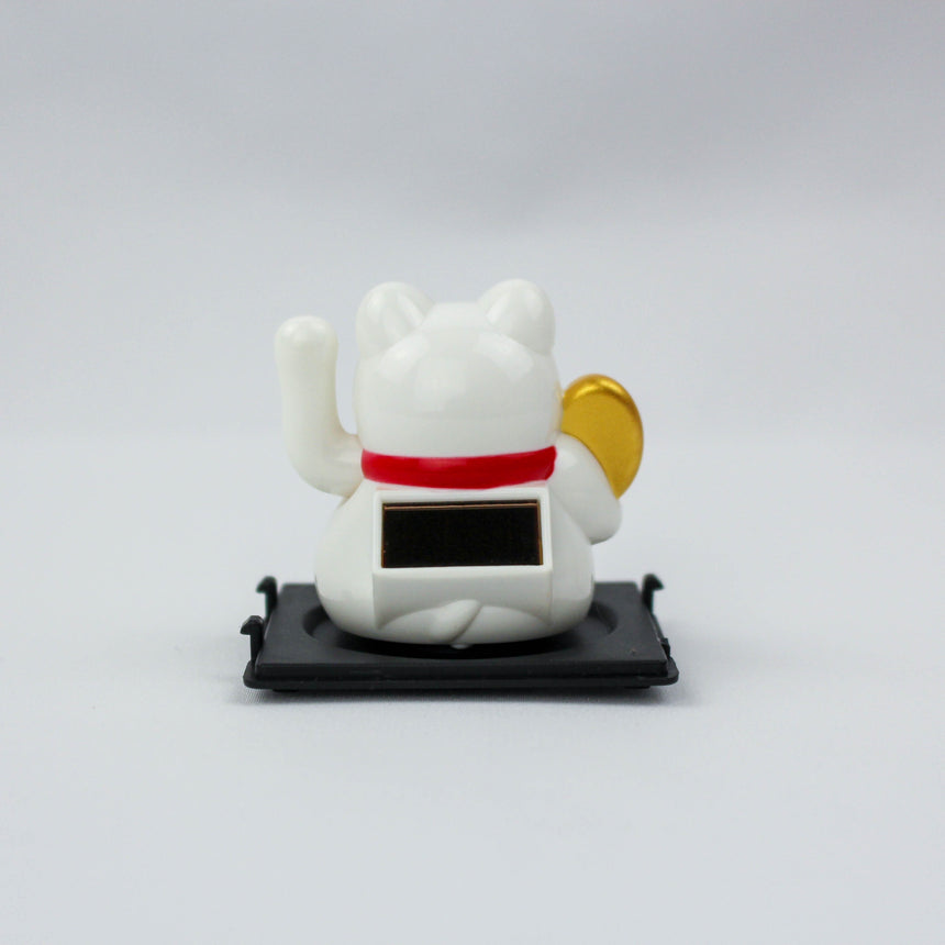 Solar Fortune Cat with Koban Coin and Fan, white back view showing the solar panel and the koban coin over its shoulder