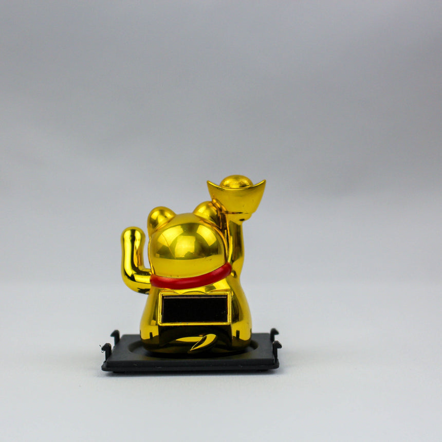 Solar Fortune Cat with Raised Ingot, gold back view showing the raised ingot, red collar, and solar panel