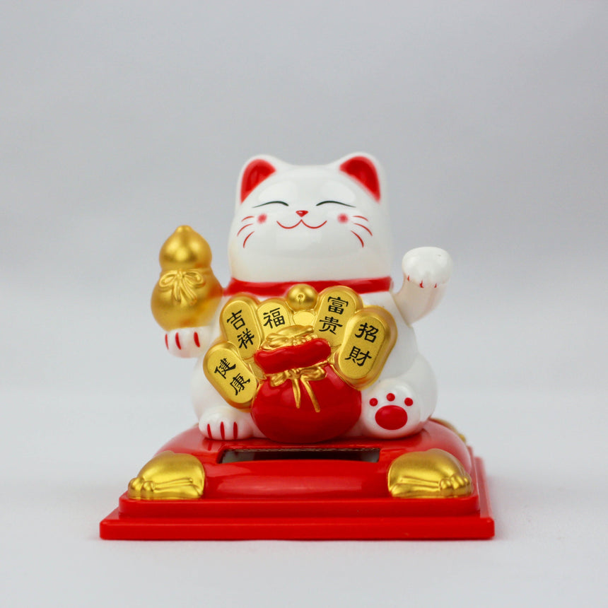 Solar Fortune Cat with Gourd and Money Bag, white front view holding the gourd beside a red bag with kanji plaques