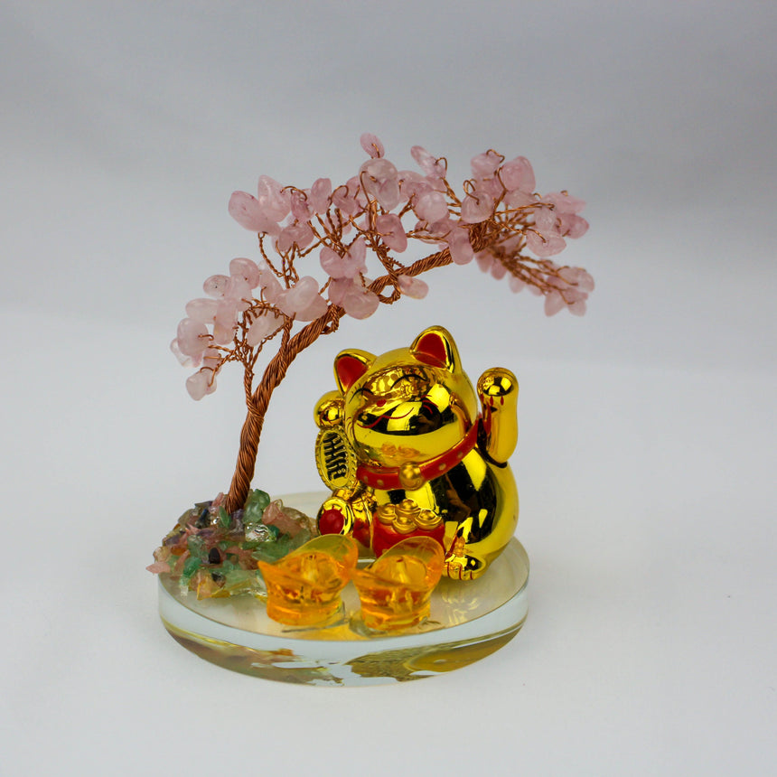 Solar Fortune Cat with Rose Quartz Gem Tree, front three-quarter view with copper wire trunk overhead and ingots in front
