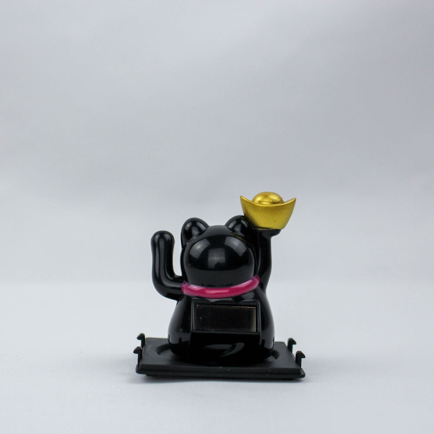 Solar Fortune Cat with Raised Ingot, black back view showing the solar panel and pink collar, ingot raised overhead