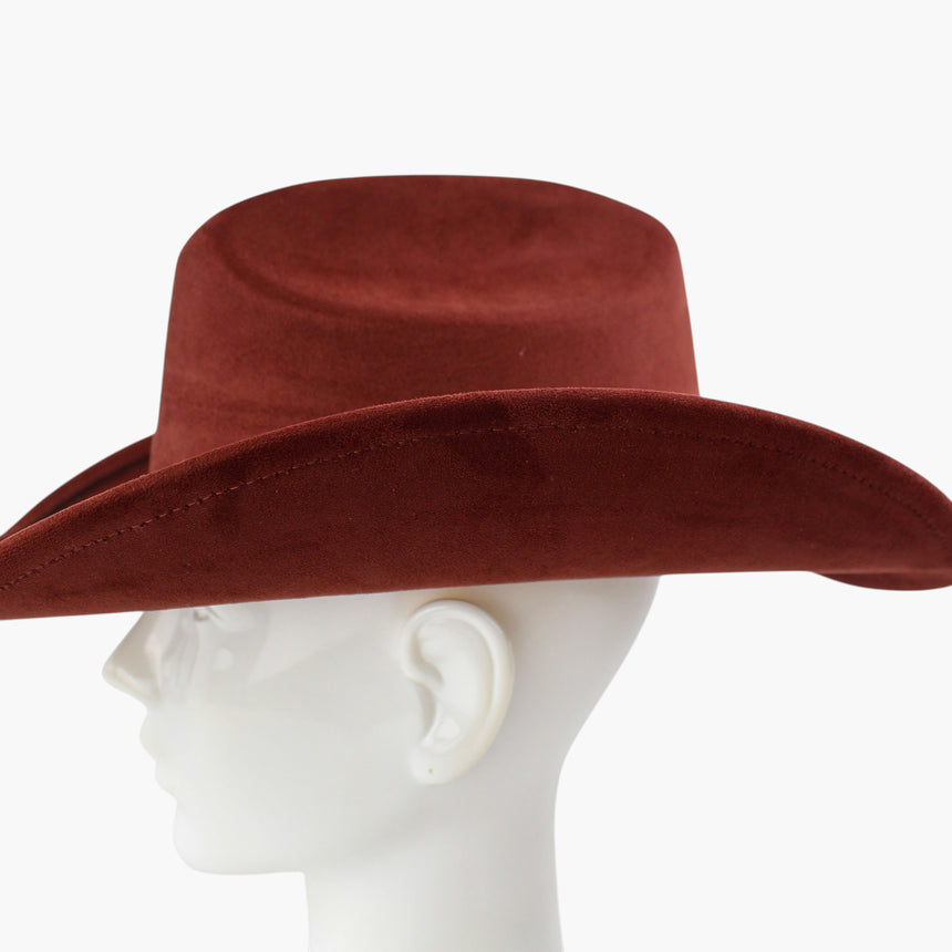 Rust Faux-Suede Western hat, in profile showing the full standing height of the crown above a flat side sweep